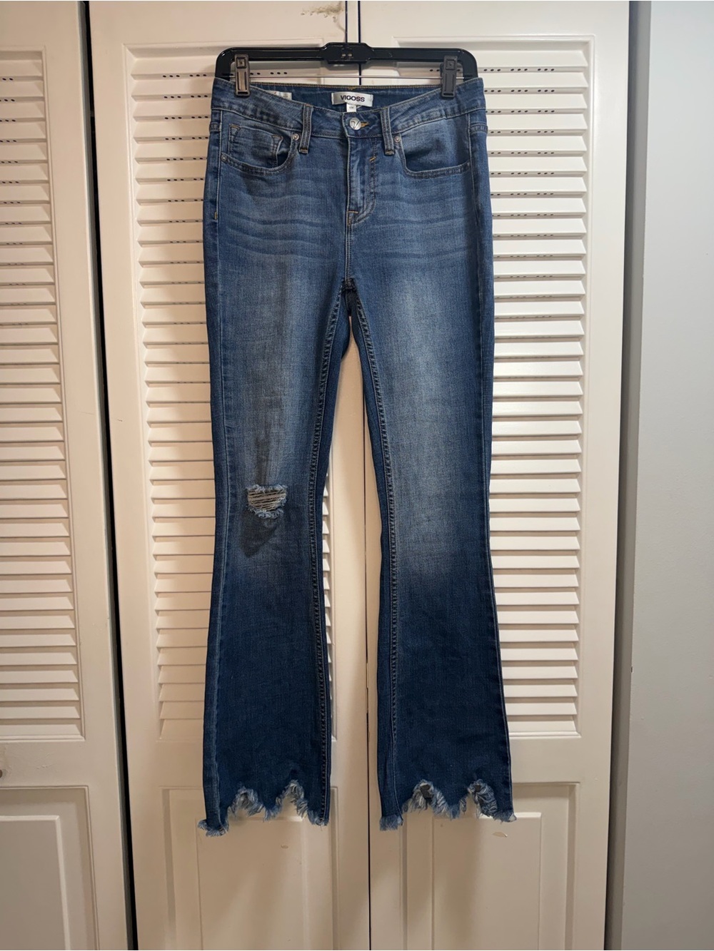 Vigoss Medium Blue Flare Jeans with Distressed Hem